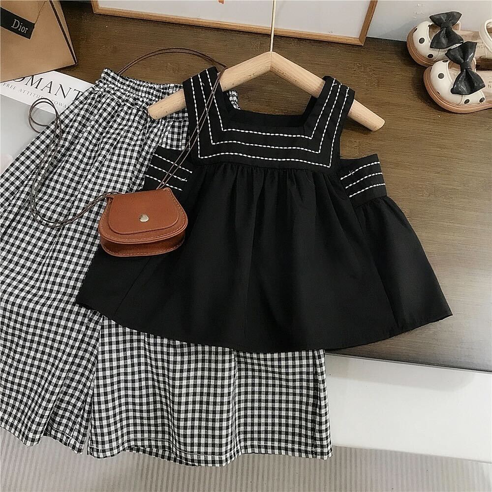 Black top and checkered palazzo set