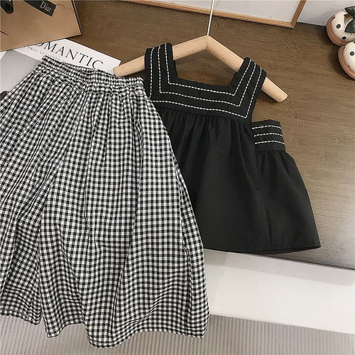 Black top and checkered palazzo set
