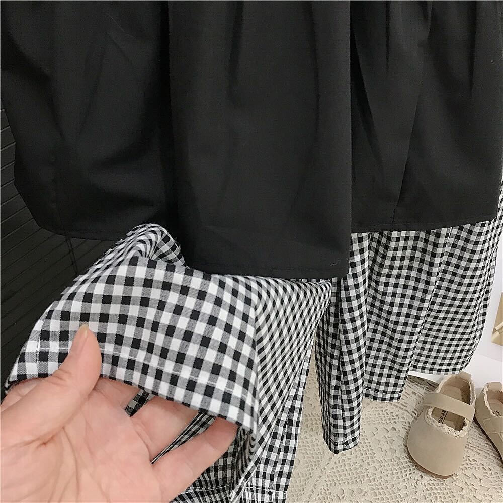 Black top and checkered palazzo set