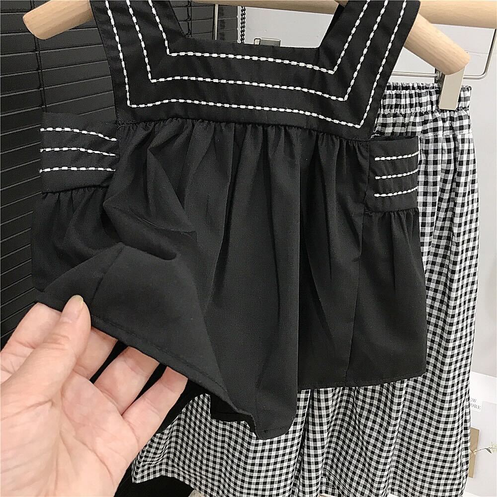 Black top and checkered palazzo set