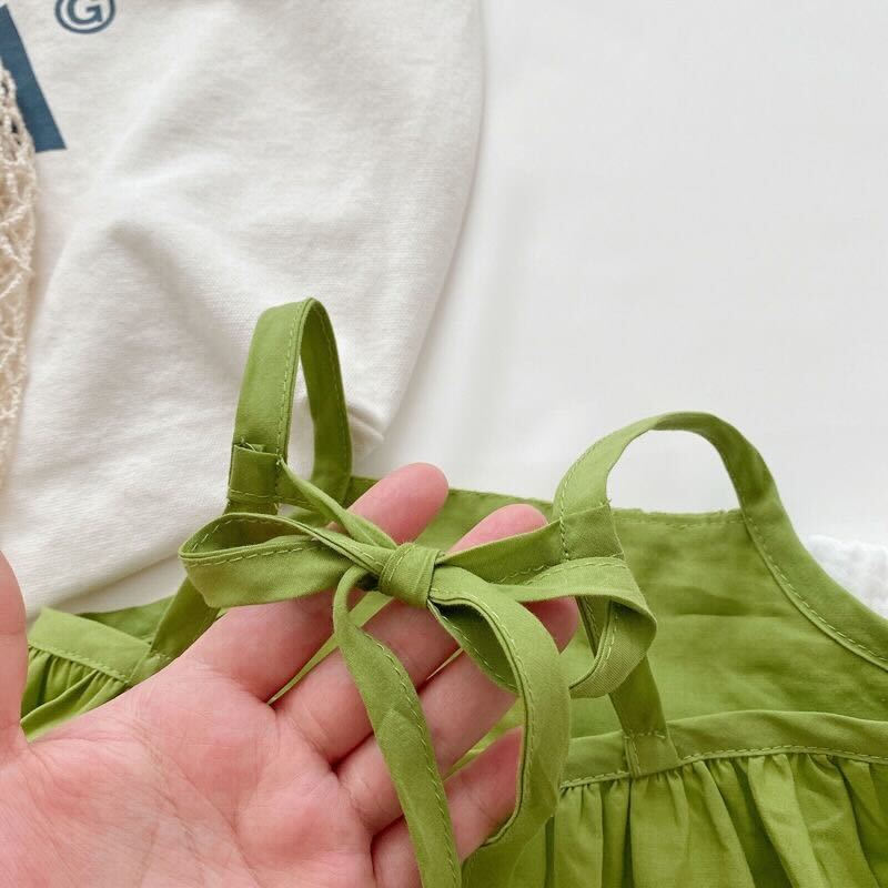 Eyelet top and Pom Pom shorts